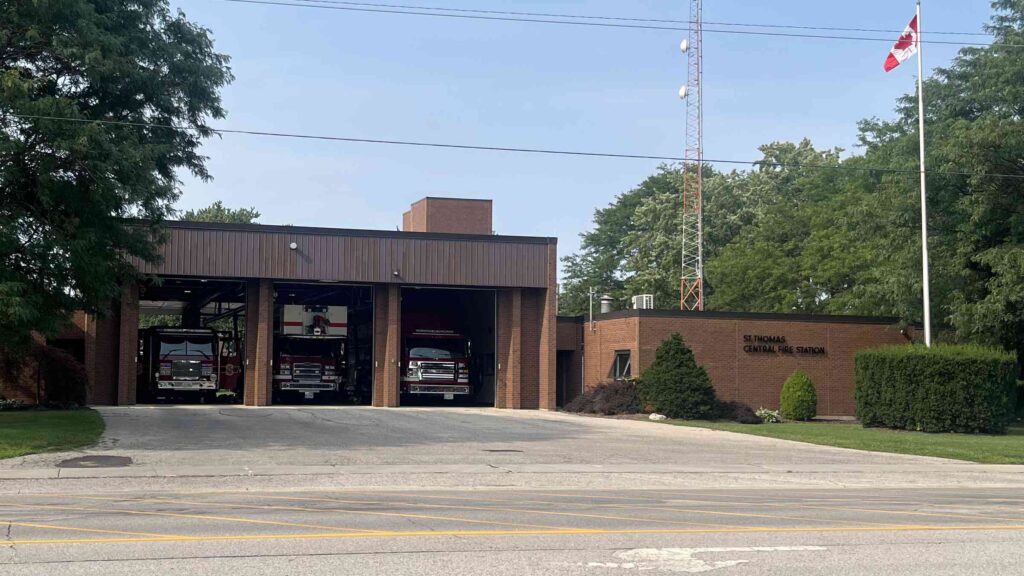 The St. Thomas Central Fire Station with fire trucks visible in its open apparatus bays
